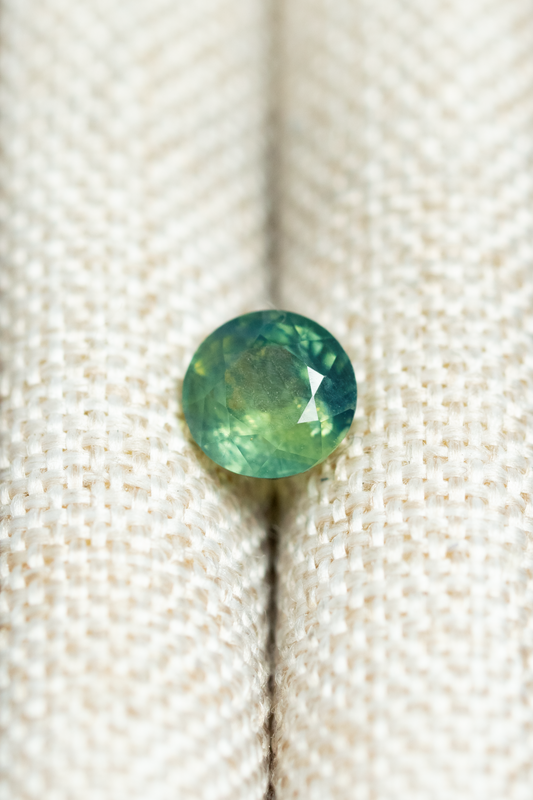 0.66ct Round Bi-Colour Blue Green Sapphire